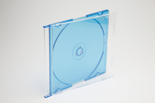 blue compact disc case against white background