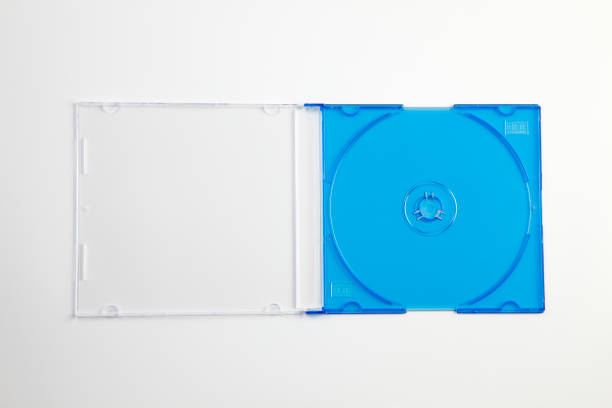blue compact disc case against white background Studio shot of plastic CD or DVD case on plain background clear cd case stock pictures, royalty-free photos & images
