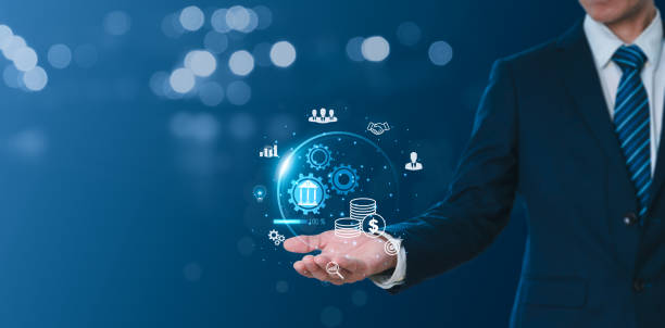 istock A businessman shows the world while displaying various business icons, global big data, internet connection application. Financial, banking concepts, as well as digital marketing, link technologies. 1659334432