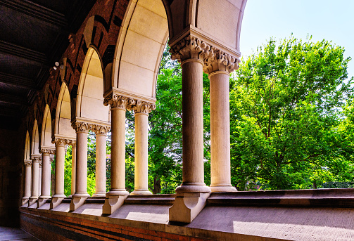 Cambridge, Massachusetts, USA - September, 2, 2023: Arch openings of the Walker porch outside of the Annenberg Hall of Memorial Hall on  the Harvard University campus.