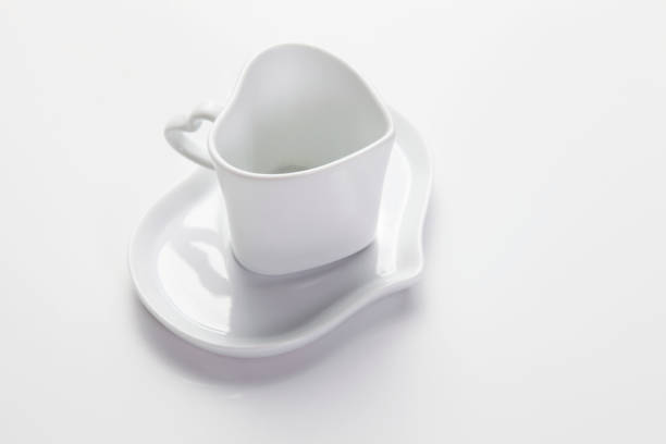 istock heart shape of coffee cup on the plain background 1659373961