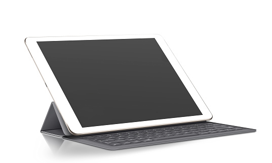 Belen, New Mexico, USA - November 1, 2014: A space gray Wi-Fi iPad Air 2 with iOS 8.1 by Apple Inc. Announced on October 16, 2014, the iPad Air 2 is now just 6.1 mm thin and weighs less than a pound, It also features an improved Retina display, improved cameras, and Touch ID.