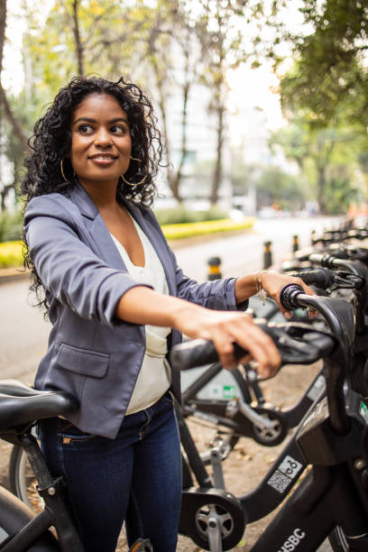 istock Woman using the city E-bike 1659399399