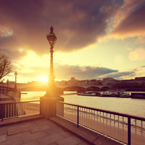 istock Thames riverbank in London at sunset 165941359