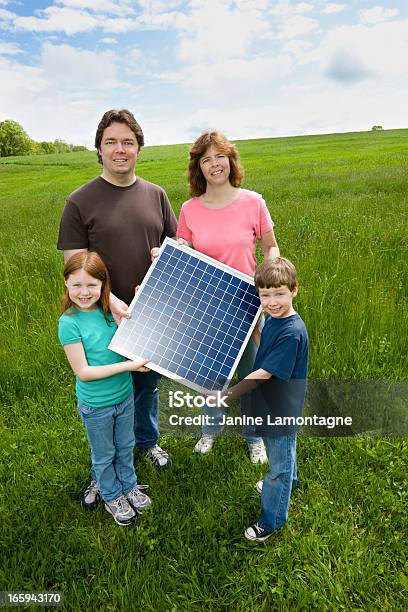 Family And Solar Panel Stock Photo - Download Image Now - Solar Panel, Family, Solar Energy