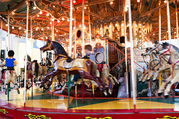 istock Carousel with horses and lights on 165943229