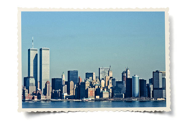 Vintage Lower Manhattan skyline Retro-styled colour photo (my own, taken February 1988) of Lower Manhattan skyline, including the Twin Towers, layered on a serrated photo border with added vintage effects. Isolated on white with a soft shadow. Clipping path provided for the serrated edge outline. Photo scanned from 35 mm slide film (Kodachrome 64). lower manhattan photos stock pictures, royalty-free photos & images