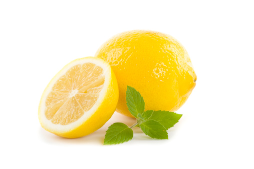 fresh lemon with mint on white background