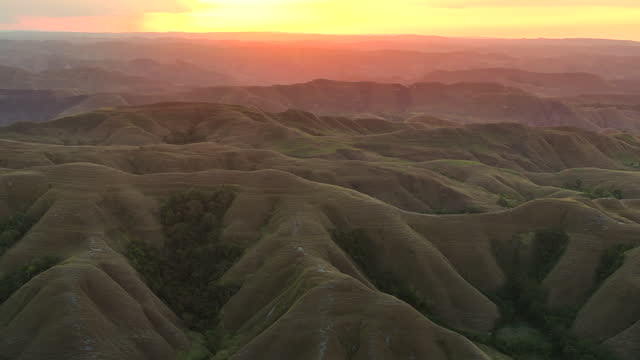 Aerial Drone Sunset Scene of Hiliwuku hills, Sumba Island, East Indonesia
