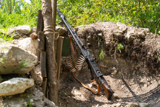 WWII German MG-42 machine gun in a trench WWII, German, MG-42, machine gun, trench mg42 stock pictures, royalty-free photos & images