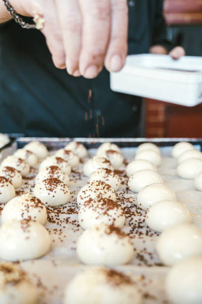istock unrecognizable man cooking buns. Traditional Italian cuisine 1659490515