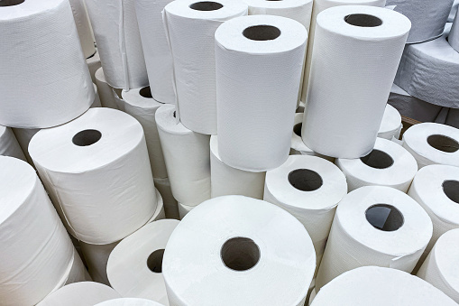 Stack of paper towels in rolls. Kitchen craft cleaning equipment