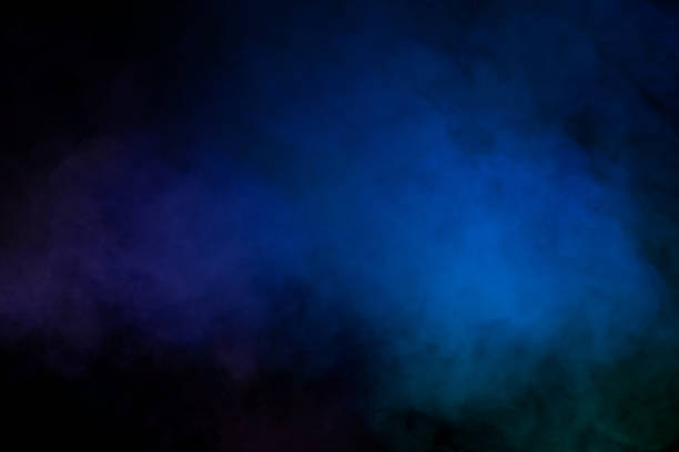 istock Blue and purple steam on a black background. 1659499599