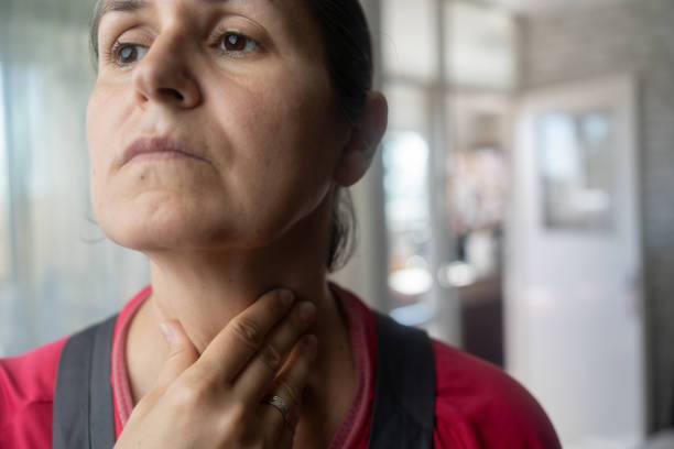 istock Woman touching neck 1659529067