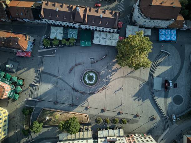 istock Central city square with a fountain in the middle 1659597544