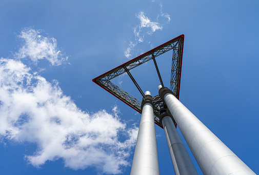 Germany, Berlin, September, 01, 2023 -Low angle view of transmission  tower against sky