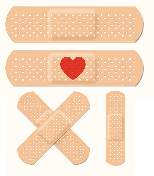 Vector Adhesive Bandages "Set of bandages. Holes are cut out of main shape, so the objects can be placed on a colored background and the color will show through. Vector file - will scale to any size without loss of quality. EPS v.10 file - shadows made with Gaussian Blur; transparency on heart shape." adhesive bandage stock illustrations