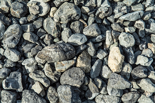 Full frame rocks and gravel texture for background or composite