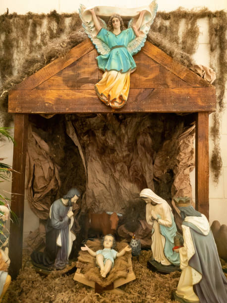 istock Traditional Christmas nativity scene with colorful figures 1659663790