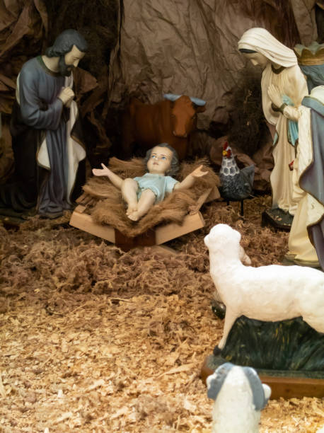 istock Traditional Christmas nativity scene with colorful figures 1659663792