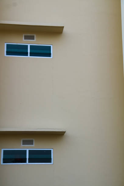 istock wall of the building with windows and blinds 1659691122