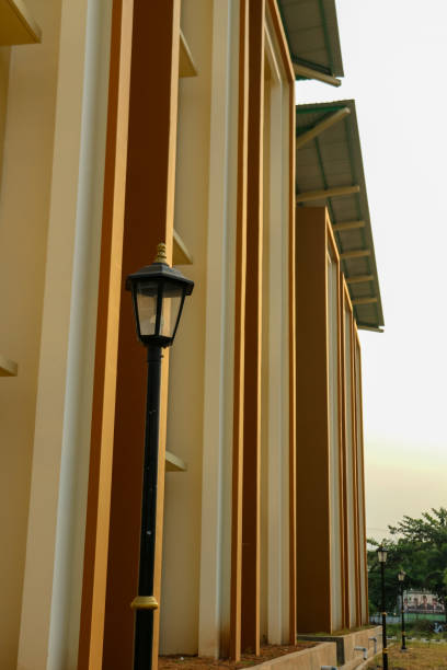 istock Lamp post on the wall of the building 1659693876