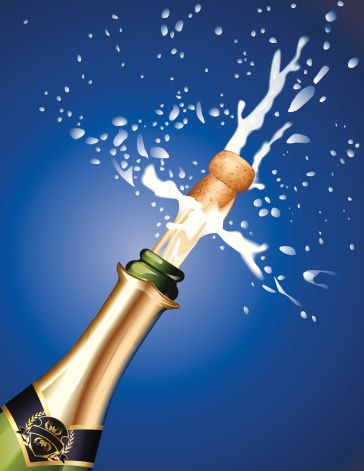 Champagne cork being popped against blue background