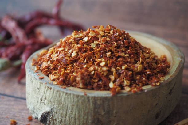 istock chili flakes in a bowl on table 1659716087