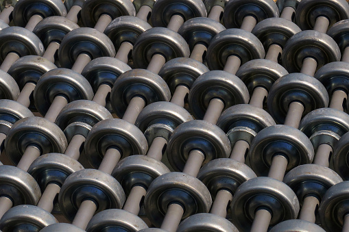 close up of a retail display of an expandable rolling skatewheel gravity conveyor belt, for sale at a salvage yard, Long Island, New York