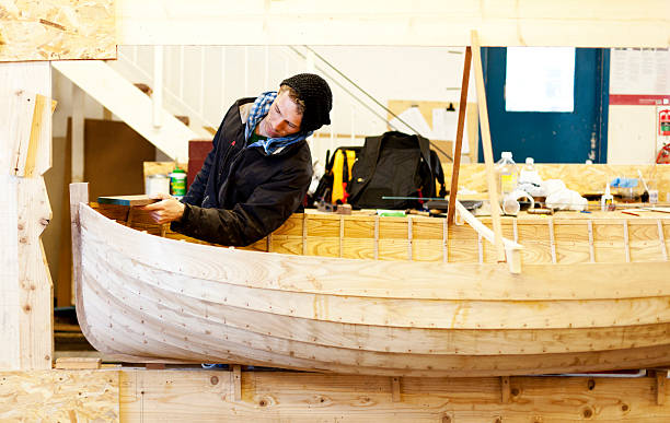 istock Handcrafting a wooden rowing boat 165972285