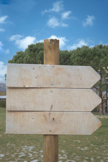 istock wooden sign in the a park with copy space concept. 1659732142