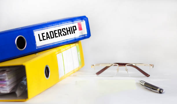istock Definition of the word Leadership on a blue folder on a white background 1659770645
