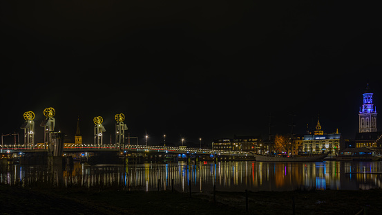 Kampen, The Netherlands - January 12, 2018: An evening photo of Kampen with the famous city bridge over the IJssel