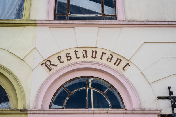 istock Restaurant logo on arch above a door.. 1659805922