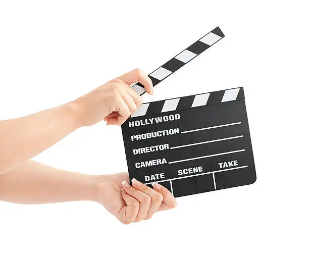 Photo of Woman with film clapper on white background