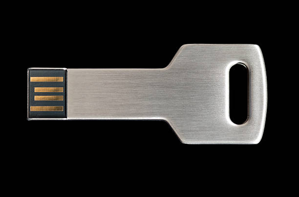 metall clé usb continuez sur fond noir - hard drive symbol ideas concepts photos et images de collection