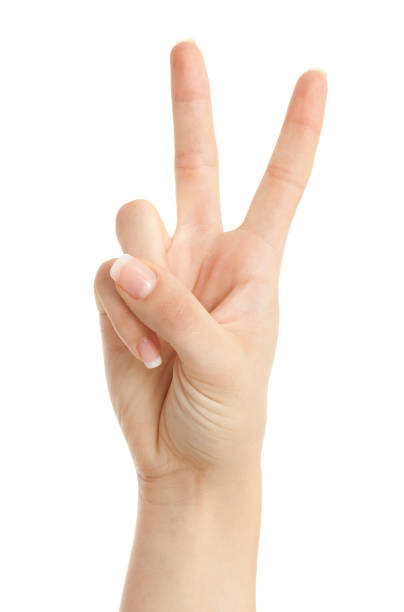 istock Woman hand showing peace sign isolated on white background 165982630