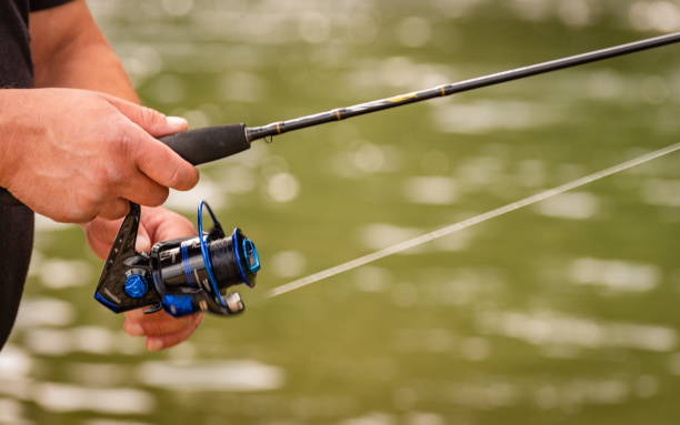 istock Fishing on a mountain river with spinning 1659841698