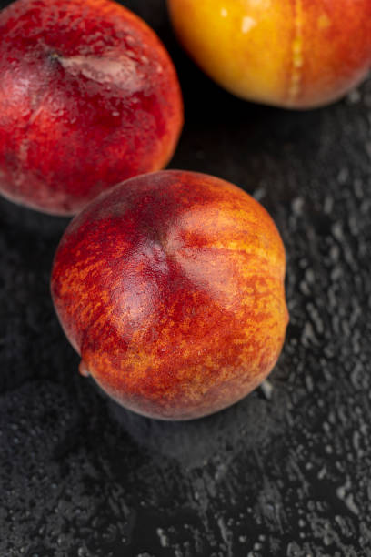 ripe delicious and fresh peaches of a red hue