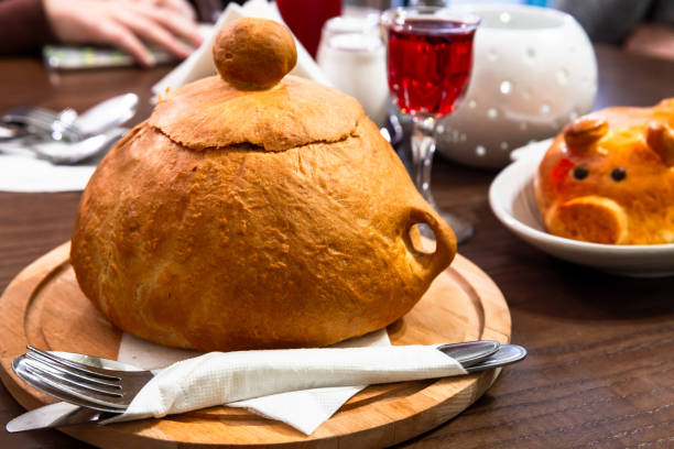 istock Bread bowl soup stands on a table in a restauraunt, close up 1659858742
