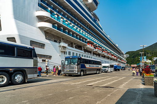 Ketchikan, USA - July 28, 2023: A cruise ship is docked at the pier waiting for tourists to board, Ketchikan, Alaska, USA.
