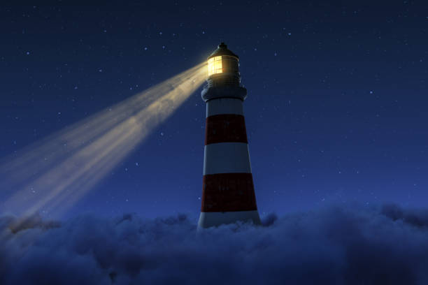 istock 3D rendering of an illuminated lighthouse with long light beam over fluffy clouds at starry night 1659863141