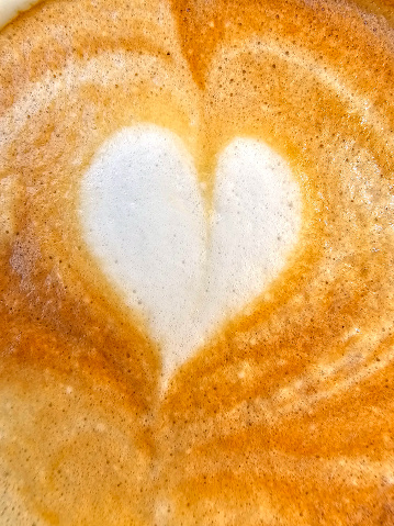 a heart and cup of coffee