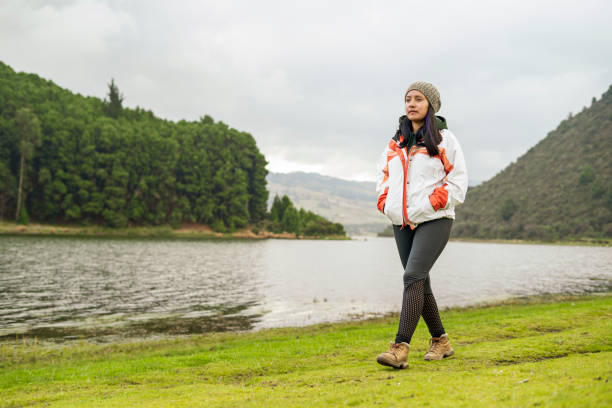 istock woman walking and getting to know a natural park during her vacation 1659882841