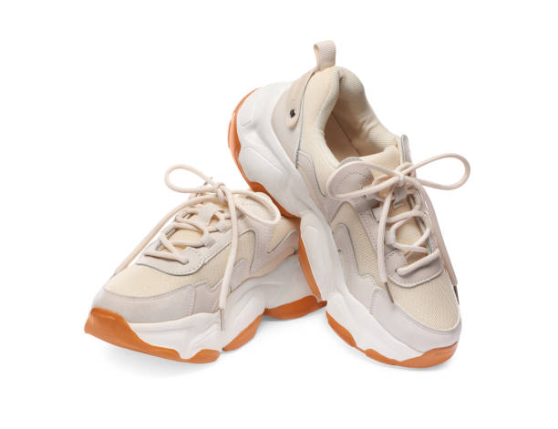 istock Pair of stylish sneakers isolated on white 1659939209