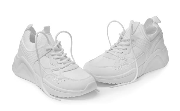 istock Pair of stylish sneakers isolated on white 1659939229