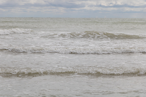 Waves in the sea on a cloudy day. Adriatic sea.