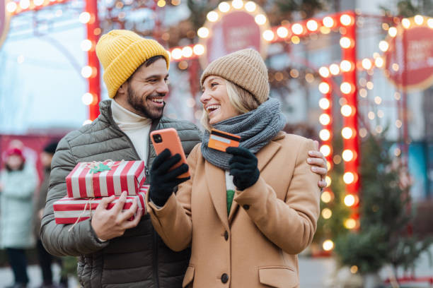 Young couple doing Christmas shopping