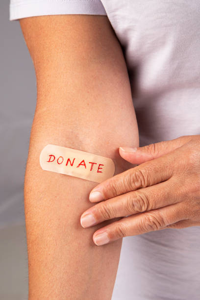 istock Blood donor with patch bandage after giving blood 1659940058