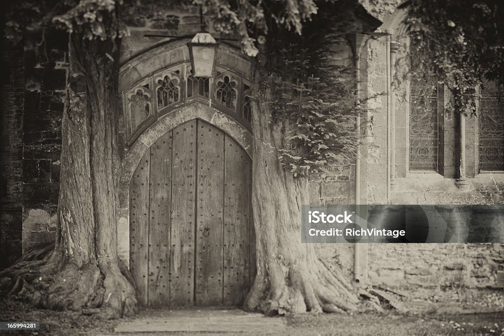 Old Church Door An old church door flanked by two yew trees in Stow-on-the-Wold, England. J.R.R. Tolkien Stock Photo